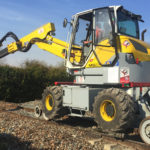 pelle rail route M585 menzi muck